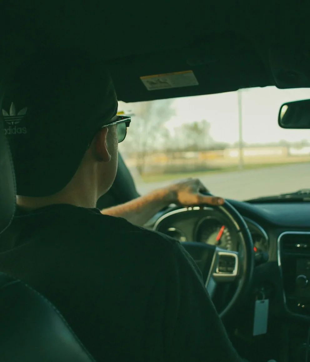 an instructor and the lesson car, from behind