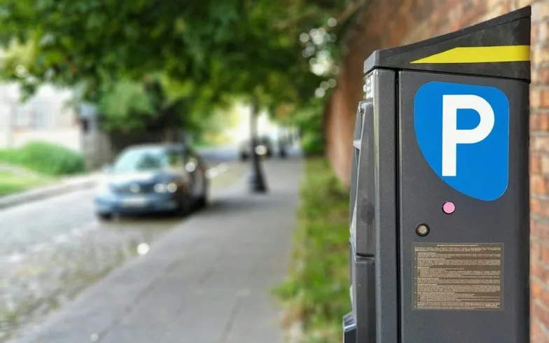a parking meter on a UK street — article card