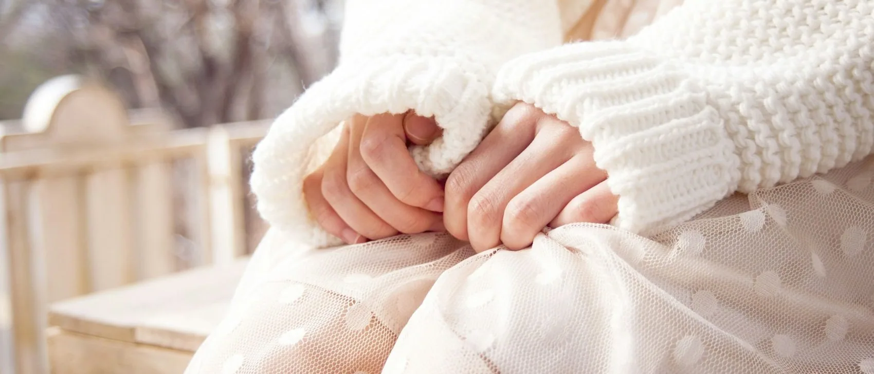 clasped hands, close