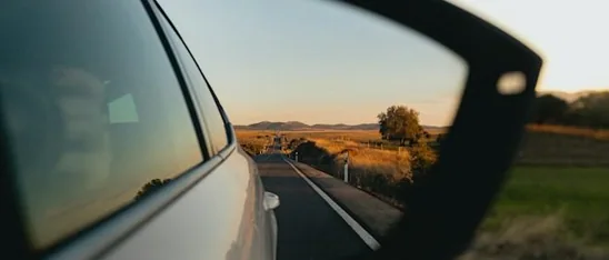 a door mirror on the open road